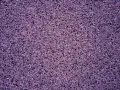Fioletowy tynk mozaikowy o drobnej granulacji. Wydajność 15 kg na ok. 3-4 m² powierzchni, zależnie od grubości warstwy.