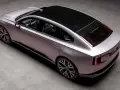 Srebrny samochód elektryczny Volvo ES90 z czarnym dachem i przyciemnianymi szybami, widok z góry.