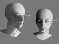 Deux études de têtes humaines en cours de dessin, montrant l'application de la lumière et de l'ombre pour créer du volume.