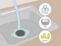 Learn how to fix a clogged kitchen sink using ice cubes, salt, and lemon.