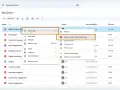 Wybieranie opcji "Otwórz za pomocą Adobe Acrobat dla Google Drive" w chmurze Google.