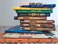 Stos książek podróżniczych top 10: "Afryka Kazika", "Dookoła świata", "Nela na 3 kontynentach" i inne.