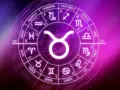 Okrąg zodiaku z symbolem Byka na pierwszym planie. 11 maja znak zodiaku to Byk, symbolizujący siłę i stabilność.