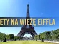 Wieża Eiffla w Paryżu, z napisem "Bilety na Wieżę Eiffla".