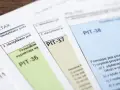 Zbliżenie na polskie formularze podatkowe PIT-36, PIT-37 i PIT-38.