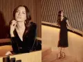 Elegancka kobieta w czarnej sukience z koronką, idealna odpowiedź na pytanie jak się ubrać do opery.