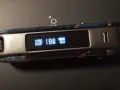 Vaporesso Luxe PM40 con pantalla mostrando 18W y 85% de batería. Diseño con detalles azules y marrones.