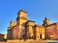 Castello Estense in Ferrara, a stunning brick fortress, is one of the best day trips from Bologna.