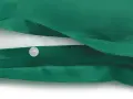 Zielony adamaszek z białym guzikiem. Co to za materiał? Miękki, gładki, idealny na pościel.