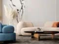 Un divano beige dalle forme morbide crea un'atmosfera accogliente, con abbinamenti di cuscini in terracotta e blu.