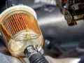 A dirty fuel filter, a common cause of bad fuel filter symptoms like engine sputtering and poor acceleration.