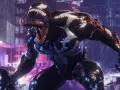 Venom, con su lengua fuera y dientes afilados, se cierne amenazante en una ciudad nocturna, listo para la acción en **Platino Spiderman 2**.