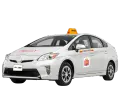 Biała taksówka z napisem "FRENOW Y" i żółtym dachem "TAXI". Idealny samochód, gdy potrzebujesz transportu.