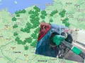Mapa Polski z zaznaczonymi stacjami paliw, gdzie można tankować CNG i LPG. Widoczny też pistolet do tankowania.