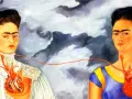 Les deux Fridas, deux portraits de l'artiste reliés par une artère, l'une en robe victorienne, l'autre en tenue colorée.