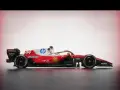 El Ferrari F1 2026, un coche de carreras rojo y blanco con patrocinadores como HP y Shell, listo para la velocidad.