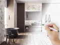 Main d'un architecte esquissant le schema d'evacuation baignoire dans une salle de bain moderne.
