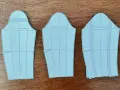 Trois patrons de manche montée, prêts à être découpés pour un projet de couture.