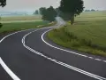 Zakręt drogi z podwójną ciągłą linią. Uważaj, bo wyprzedzanie na podwójnej ciągłej grozi mandatem.