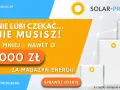 Białe magazyny energii na tle paneli słonecznych, z napisem "18 000 zł".