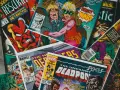 Stos kolorowych okładek komiksów Marvela, w tym Deadpool i Fantastyczna Czwórka.