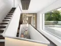 Modernes Treppenhaus gestalten: Schwebende Holzstufen, minimalistische weiße Wände und eine auffällige Hängeleuchte schaffen ein elegantes Ambiente.