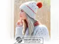 Dziewczyna w czapce z pomponem, idealna na zimowe dni. Zestaw zrobiony własnoręcznie, w stylu pompony diy.