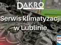 Silnik samochodowy z widocznym napisem "Serwis klimatyzacji w Lublinie" i logo DAKRO SERVICE.