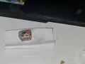 Cartucho de Vaporesso XROS con líquido derramado, indicando posibles problemas.