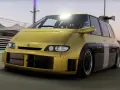 Żółty Renault Espace F1 z potężnym spojlerem pędzi po torze wyścigowym.