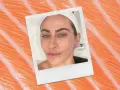 A woman receives a cosmetic injection, possibly part of a salmon sperm facial treatment, against a backdrop of salmon flesh.