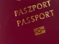 Czerwony paszport z napisem "PASZPORT" i symbolem odcisku palca. Wkrótce wizyta w biurze paszportowym w Koninie.