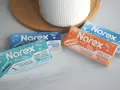 Kilka opakowań suplementów diety Narine w różnych wariantach (Duo, Forte, Sachats) na jasnym tle.