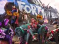 Postacie z gry Fortnite, w tym Doktor Strange i fioletowy Spider-Man, pozują na tle ogromnego napisu "FORTNITE".