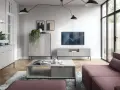 Nowoczesny salon z dużą **ścianą TV**, minimalistycznymi meblami i wygodną, różową sofą.