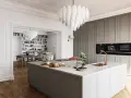 Elegante cucina stile parigino con isola centrale, mobili grigi, elettrodomestici a scomparsa e un'ampia libreria sullo sfondo.