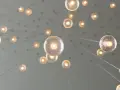 Många glödlampor hänger från taket. Tänk att byta halogen till LED för att spara energi.