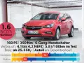 Roter Opel Astra Sportstourer mit 1.6 BiCDTi Motor. Die cdti bedeutung steht hier für einen Dieselmotor mit Turboaufladung.