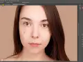 Portrait d'une jeune femme avec des imperfections cutanées, en cours de retouche dans Photoshop.