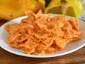 Farfalle condite con una cremosa salsa ai peperoni, un piatto colorato e gustoso.