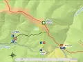 Mapa turystyczna z zaznaczonymi szlakami, schroniskiem, campingiem i Przełęczą Wyżniańską.