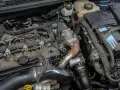 Silnik 1.7 CDTI z widocznymi wtryskiwaczami, turbosprężarką i akumulatorem.