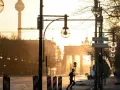 A lone runner passes the Brandenburg Gate at sunrise. This iconic Berlin landmark is a must-see, no matter how many days in Berlin you have.