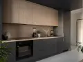 Cocinas de leña modernas con gabinetes de madera clara y encimeras oscuras. Un horno, licuadora y plantas decoran el espacio.