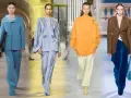 Modelli sfilano con eleganti completi pantalone, un'idea chic per come vestirsi ad un matrimonio con pantaloni.
