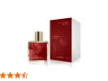 Elegancka butelka perfum "Brilliance Route 450" od Chatler i jej czerwone opakowanie z motywem miasta.