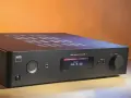Wzmacniacz NAD C368 w teście. Elegancki, czarny sprzęt audio z wyświetlaczem pokazującym poziom głośności Phono -69.0 dB.