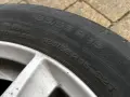 Oznaczenie opon 185/55 R 15. Widoczna jest też informacja "RADIAL TUBELESS" oraz indeks nośności i prędkości 82T.