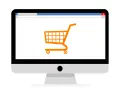 Monitor z ikoną koszyka zakupowego, symbolizujący branżę e-commerce i zakupy online.
