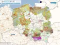 Mapa Polski z kolorowymi obszarami wskazującymi różne klasy ziemi. Widoczne miasta: Warszawa, Wrocław, Gdańsk.